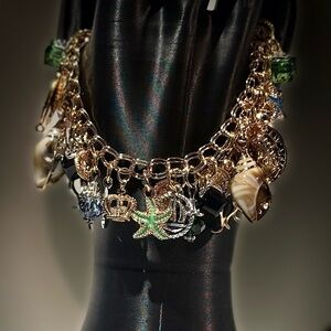 Gold Charm Bracelet with Green and Black Accents
